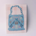 Carte postale A6 — Sac bleu en point de croix — Isobel Rose Illustration